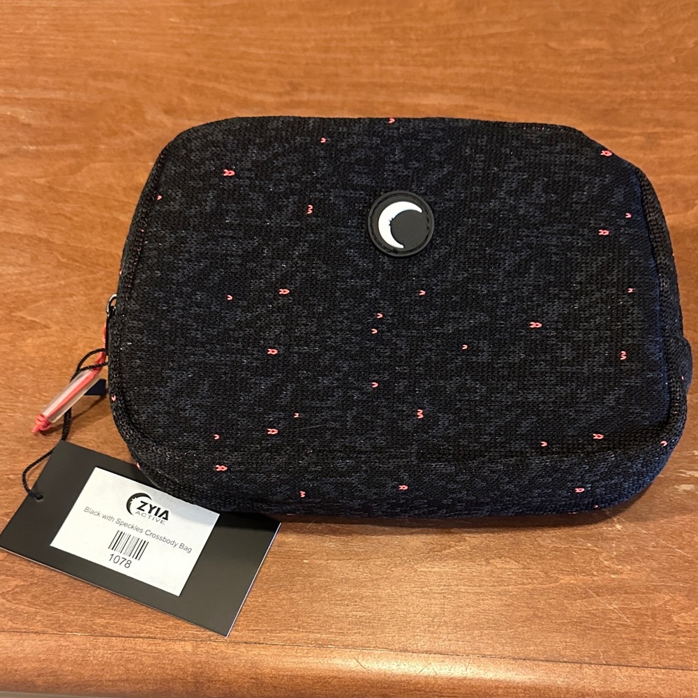 Compact Black Pouch with Red Accents